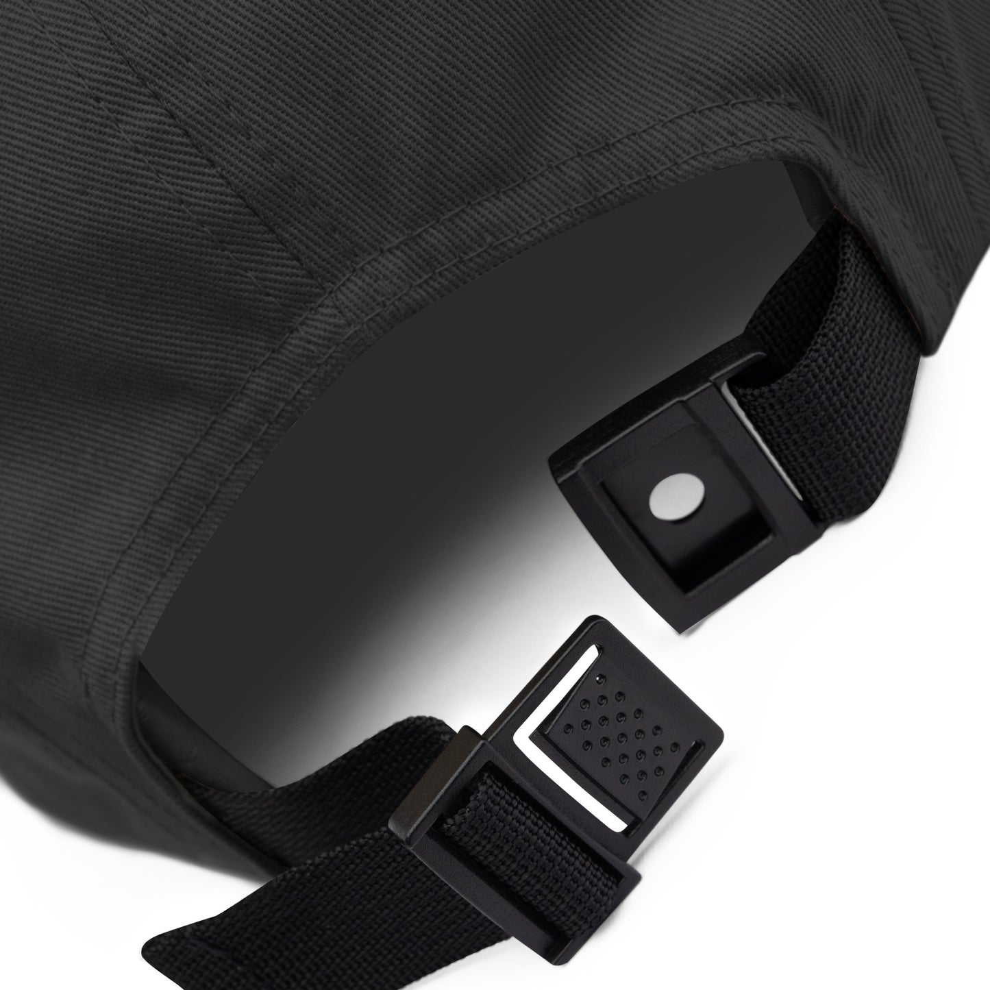Image shows nylon strap and clip of five panel camper-style cap