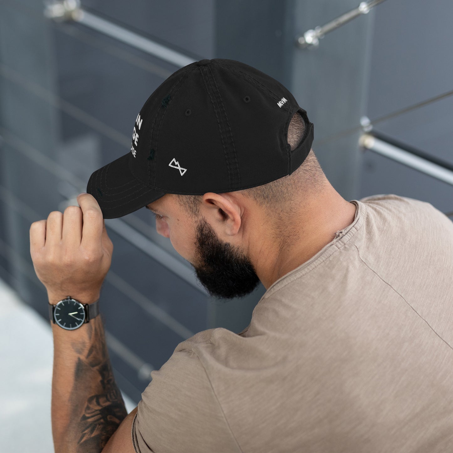 Man modelling black coloured dad hat