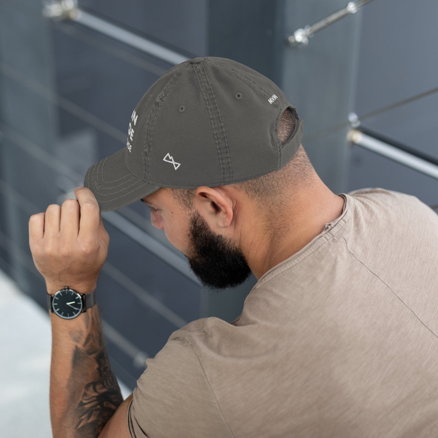 Man modelling charcoal grey coloured dad hat
