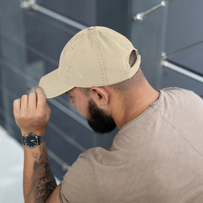 Man modelling khaki coloured dad hat